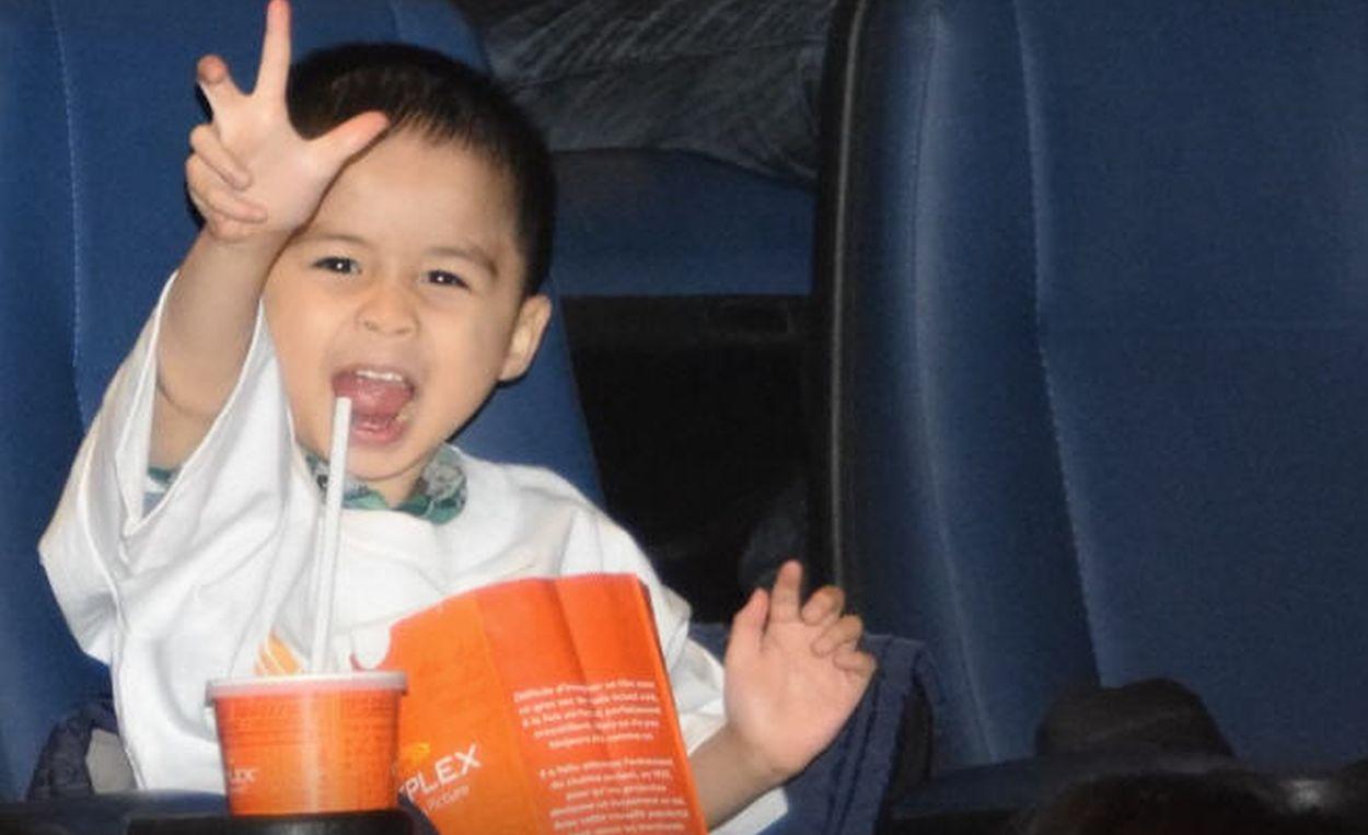 Little boy in the cinema