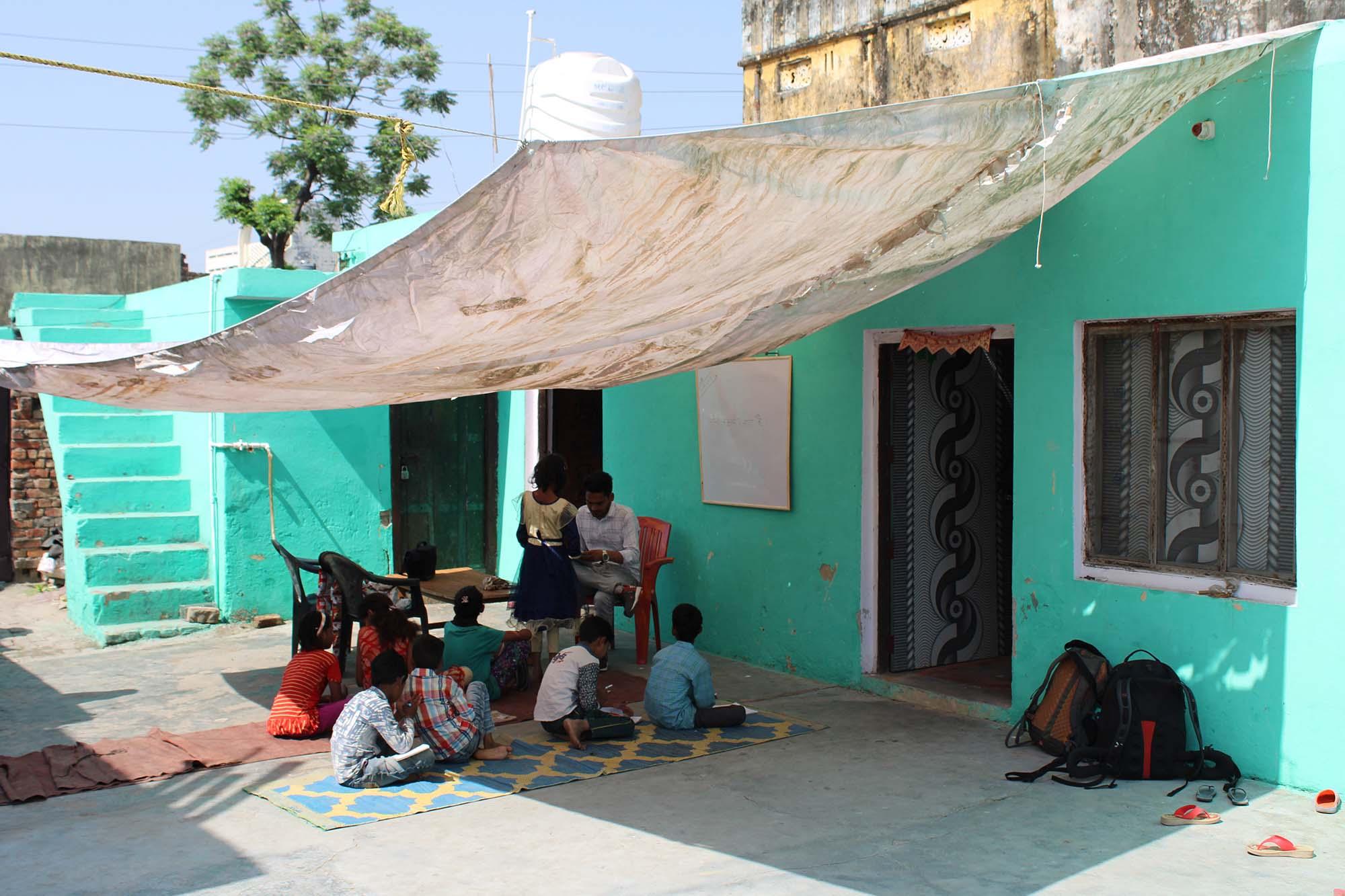 Shanti Public School building with solar sail